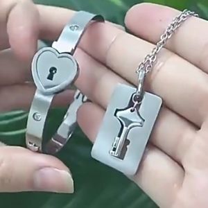 Stainless steel heart lock and key necklace and bracelet set.Lock opens with key